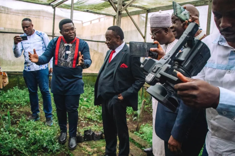 Press film a Mumita team member showing officials a greenhouse