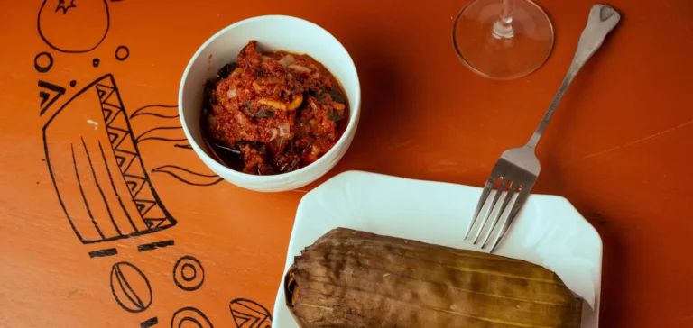 Leaf-wrapped dishes served with a bowl of red stew