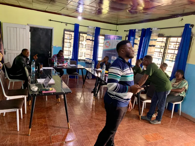 Participants at a snail-farming training session