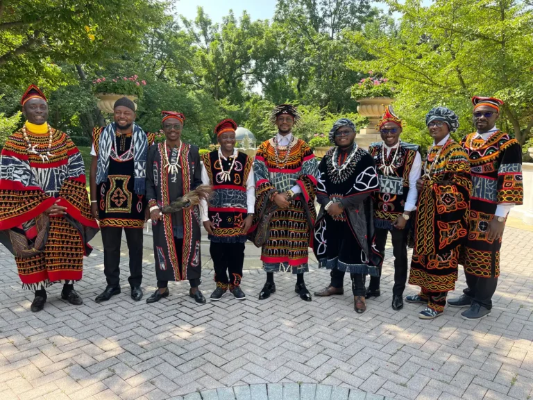 The delegation in Toghu on a brick plaza